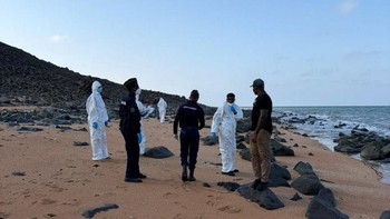 Authorities inspect the shore after a boat carrying about 305 people capsized while sailing from Djibouti to Yemen, leaving at least 109 migrants, including 15 children, dead and more than 116 missing, according to the United Nations' International O