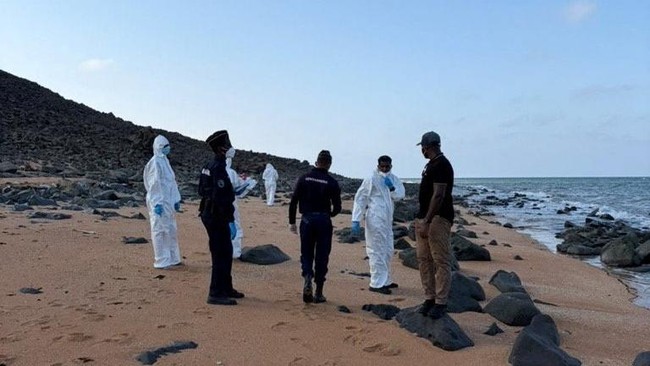 Authorities inspect the shore after a boat carrying about 305 people capsized while sailing from Djibouti to Yemen, leaving at least 109 migrants, including 15 children, dead and more than 116 missing, according to the United Nations' International O