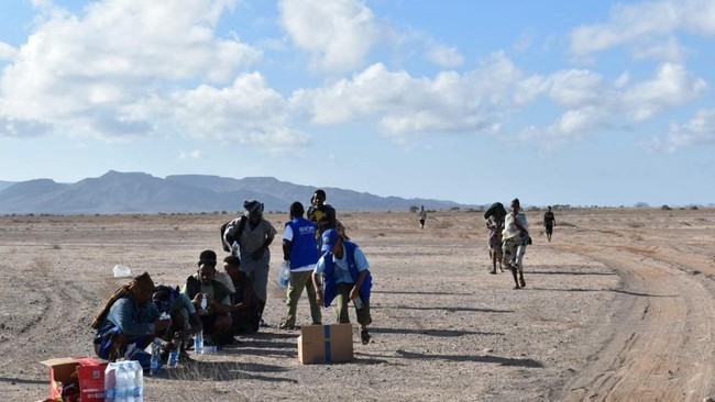 International Organization for Migration workers receive migrants after a boat carrying about 305 people capsized while sailing from Djibouti to Yemen, leaving at least 109 migrants, including 15 children, dead and more than 116 missing, according to
