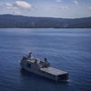Philippine Navy's BRP Tarlac landing ship is seen anchored off the shore of Calayan Island, Cagayan on June 30, 2023. Amid increasing geopolitical tension between the US, China, and Taiwan, the Philippines is grappling with the potential fallout. Bat