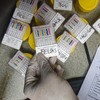 Tim gabungan Direktorat Tindak Pidana Narkoba Bareskrim Polri, Badan Narkotika Nasional (BNN), dan Polda Metro Jaya memeriksa hasil tes urine milik terduga pelaku tindak pidana peredaran narkoba di Kompleks Permata (Kampung Ambon), Kedaung Kaliangke,