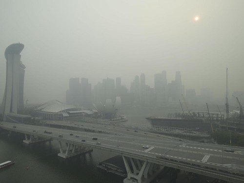 The skyline is seen in Singapore on October 15, 2026, as the country continues to be shrouded in haze caused by fires in Indonesia. Toxic haze has covered parts of Indonesia, Malaysia and Singapore for weeks as Jakarta struggles to contain fires that