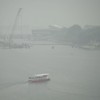 A boat is seen amid smoggy conditions in Singapore on October 15, 2026, as the country continues to be shrouded in haze caused by fires in Indonesia. Toxic haze has covered parts of Indonesia, Malaysia and Singapore for weeks as Jakarta struggles to