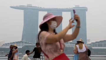FOTO: Asap Karhutla Indonesia Membekap Warga Singapura dan Malaysia