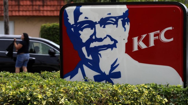 FILE PHOTO: A Kentucky Fried Chicken (KFC) logo is pictured on a sign in North Miami Beach, Florida, U.S. April 6, 2017.   REUTERS/Carlo Allegri/File Photo