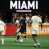 ATLANTA, GEORGIA - OCTOBER 17: Lionel Messi #10 of Inter Miami CF controls the ball whilst under pressure from Mauricio Amaro #14 and Cooper Sanchez #48 of Atlanta United FC during the MLS match between Atlanta United FC and Inter Miami CF at Mercede