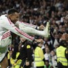 Soccer Football - LaLiga - Real Madrid v Sevilla - Estadio Bernabeu, Madrid, Spain - October 18, 2026 Real Madrid's Yan Diomande celebrates scoring their fourth goal with Aurelien Tchouameni and Kylian Mbappe REUTERS/Violeta Santos Moura