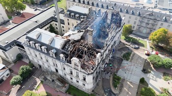 This handout screen grab from video footage released on October 18, 2026 by the SDIS 87 (Haute Vienne region fire departement) shows the destroyed Limoges city hall after being set on fire, a day after nationwide protests against the "high cost of li