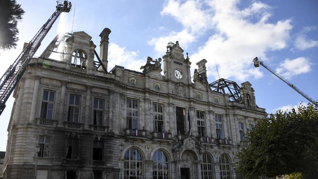 This photograph shows the partially burnt facade of the Limoges city hall a day after riot and looting following nationwide protests against the