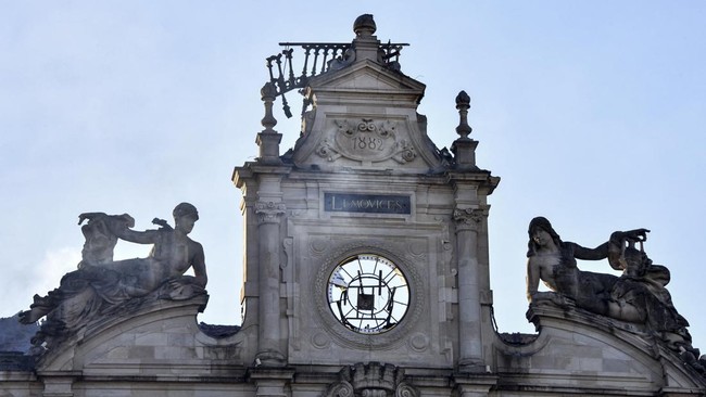 This photograph shows the partially burnt facade of the Limoges city hall following the collapse of its belfry a day after riot and looting following nationwide protests against the