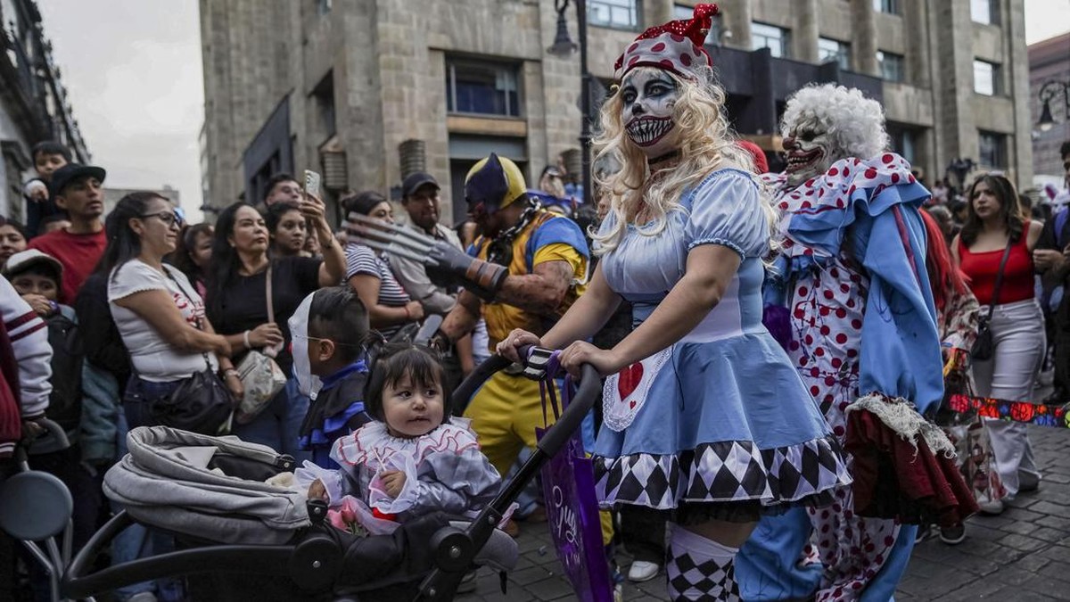 People take part in the annual zombie walk in Mexico City, Mexico, October 18, 2026. REUTERS/Toya Sarno Jordan