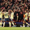 Soccer Football - Premier League - Nottingham Forest v Arsenal - The City Ground, Nottingham, Britain - October 18, 2026 Arsenal's Noni Madueke celebrates scoring their first goal with Declan Rice and Mikel Merino REUTERS/Chris Radburn EDITORIAL USE