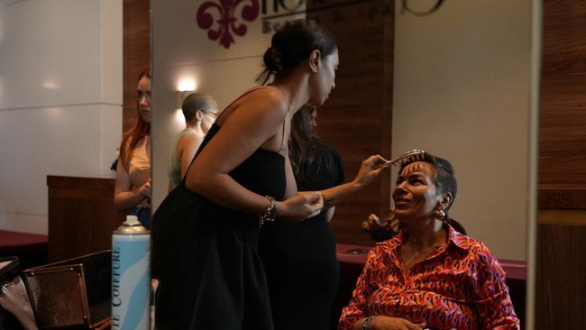 Breast cancer patients and survivors prepare backstage with hair and make-up ahead of the fifth edition of the Warrior Fashion Show, organized by Femmes Maghrebines magazine during its annual Pink October breast cancer awareness campaign, in Tunis, T