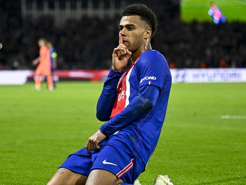PSG's French forward #14 Desire Doue celebrates after scoring his team's first goal during the UEFA Champions League first round day 3 football match between Paris Saint-Germain (PSG) and FC Barcelona at the Parc de Princes stadium in Paris on Octobe