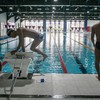 Atlet National Paralympic Committee (NPC) Indonesia cabang olahraga renang Zaki Zulkarnain (kiri), Jendi Pangabean Akmal (kedua kiri), dan Abdil Majid Rahman (kanan) menjalani Pemusatan Latihan Nasional (Pelatnas) renang di Paralympic Training Center
