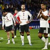 Soccer Football - UEFA Champions League - Como v Manchester United - Stadio Giuseppe Sinigaglia, Como, Italy - October 21, 2026  Manchester United's Mason Mount, Noussair Mazraoui and Diogo Dalot look dejected after the match REUTERS/Alessandro Garof