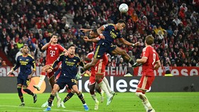 Soccer Football - UEFA Champions League - Bayern Munich v Arsenal - Allianz Arena, Munich, Germany - October 21, 2026  Arsenal's Jurrien Timber in action REUTERS/Angelika Warmuth