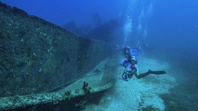 A scuba diver inspects the German-built Star Gerren shipwreck in the southern Caribbean Sea, off Palm Beach in the western coast of Aruba, on October 22, 2026. (Photo by Joseph Prezioso / AFP)