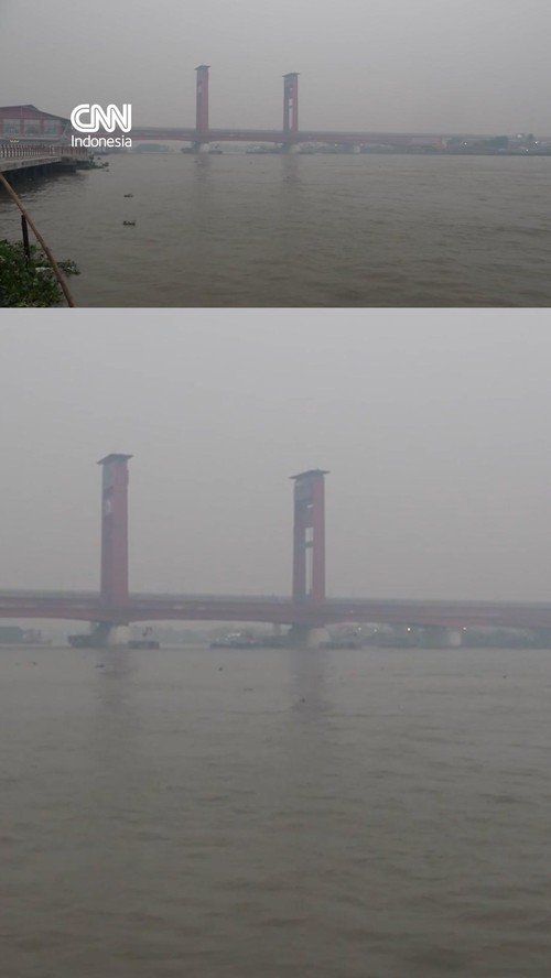Kabut asap pekat akibat kebakaran hutan dan lahan menyelimuti Palembang, Sumatera Selatan pada Kamis (22/10).