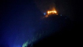 Smoke and fire rise following a fire incident at the Kehlsteinhaus, the Eagle's Nest, in Berchtesgaden, Bavaria, Germany, in this handout image released October 24, 2026.  Markus Leitner/Bavarian Red Cross/Handout via REUTERS    THIS IMAGE HAS BEEN S