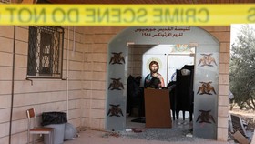 The grounds of Saint Georges Greek Orthodox Church, where gunmen opened fire during a funeral the previous day, is cordoned-off, in the village of Hamoud, Karak, Jordan, October 24, 2026. REUTERS/Alaa Al Sukhni