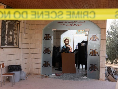 The grounds of Saint Georges Greek Orthodox Church, where gunmen opened fire during a funeral the previous day, is cordoned-off, in the village of Hamoud, Karak, Jordan, October 24, 2026. REUTERS/Alaa Al Sukhni
