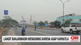 ISPA Banjarmasin, asap karhutla, langit menguning, Handil Bakti, kebakaran hutan, pasien ISPA,