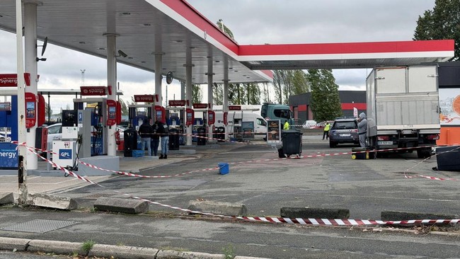 French police work at the scene after a drive-by shooting that killed one person and injured several others in Trappes, in the Yvelines department, near Paris, France, October 23, 2026. REUTERS/Antony Paone