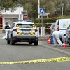 French police work at the scene after a drive-by shooting that killed one person and injured several others in Trappes, in the Yvelines department, near Paris, France, October 23, 2026. Picture taken with a mobile phone.  REUTERS/Antony Paone