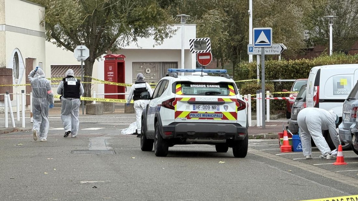 French police work at the scene after a drive-by shooting that killed one person and injured several others in Trappes, in the Yvelines department, near Paris, France, October 23, 2026. Picture taken with a mobile phone.  REUTERS/Antony Paone