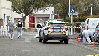 French police work at the scene after a drive-by shooting that killed one person and injured several others in Trappes, in the Yvelines department, near Paris, France, October 23, 2026. Picture taken with a mobile phone.  REUTERS/Antony Paone