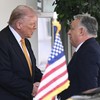 (L/R) US President Donald Trump greets Hungarian Prime Minister Viktor Orban outside the West Wing of the White House in Washington, DC on November 7, 2025. (Photo by SAUL LOEB / AFP)