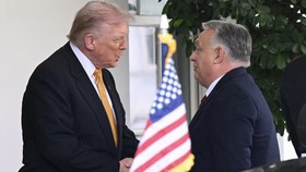 (L/R) US President Donald Trump greets Hungarian Prime Minister Viktor Orban outside the West Wing of the White House in Washington, DC on November 7, 2025. (Photo by SAUL LOEB / AFP)