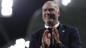 Melbourne Victory's head coach Giovanni Savarese applauds supporters after the AFC Champions League Two football match between Melbourne Victory and FC Seoul at Melbourne Rectangular Stadium in Melbourne on October 14, 2026. (Photo by Martin KEEP / A