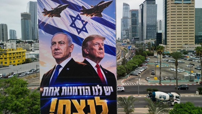 A drone view of an election campaign display for Israeli Prime Minister Benjamin Netanyahu's Likud party, depicting Netanyahu and US President Donald Trump with the words in Hebrew 