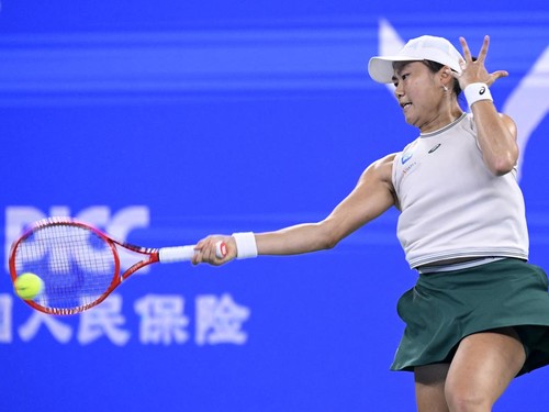 Indonesia's Janice Tjen hits a return to USA's Ann Li during the womens singles match at the Wuhan Open tennis tournament in Wuhan, China's Hubei province on October 15, 2026. (Photo by WANG Zhao / AFP)