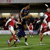 Soccer Football - Carabao Cup - Fourth Round - Fleetwood Town v Arsenal - Highbury Stadium, Fleetwood, Britain - October 27, 2026 Arsenal's Jurrien Timber in action with Fleetwood Town's Jake Batty. Action Images via Reuters/Jason Cairnduff