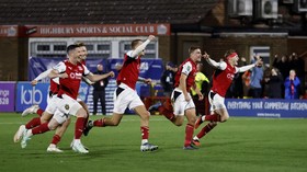 Soccer Football - Carabao Cup - Fourth Round - Fleetwood Town v Arsenal - Highbury Stadium, Fleetwood, Britain - October 27, 2026 Fleetwood Town's Finley Potter and teammates celebrate winning the penalty shootout Action Images via Reuters/Jason Cair