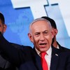 Israeli Prime Minister and Likud party leader Benjamin Netanyahu waves as he gives a statement following exit polls for Israel's national election, at Likud's election headquarters in Jerusalem, October 28, 2026. REUTERS/Ammar Awad
