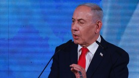 Israeli Prime Minister and Likud party leader Benjamin Netanyahu speaks as he reacts to exit polls, at his party headquarters during Israel's national election, in Jerusalem, October 28, 2026. REUTERS/Ronen Zvulun