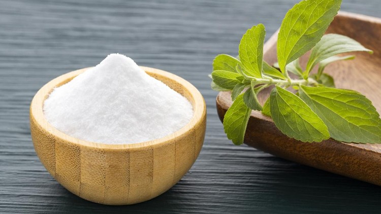 Leaves of the stevia plant - Bowl with stevia powder
