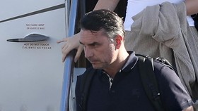 Flavio Bolsonaro steps off a plane after arriving at Opa Locka Executive Airport in Miami, Florida on October 28, 2026. Brazil's defeated right-wing presidential candidate Flavio Bolsonaro stepped out of a private plane in Florida today, AFP witnesse
