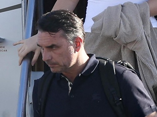 Flavio Bolsonaro steps off a plane after arriving at Opa Locka Executive Airport in Miami, Florida on October 28, 2026. Brazil's defeated right-wing presidential candidate Flavio Bolsonaro stepped out of a private plane in Florida today, AFP witnesse