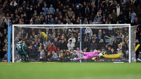 Soccer Football - Carabao Cup - Fourth Round - Manchester City v Brighton & Hove Albion - Etihad Stadium, Manchester, Britain - October 28, 2026 Brighton and Hove Albion's Yasin Ayari has his penalty saved by Manchester City's Geronimo Rulli during a