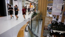Participants jog during an indoor running event at a shopping mall, organised in response to haze from forest fires in Indonesias Kalimantan region that blanketed the region, at Petaling Jaya, Malaysia October 28, 2026. REUTERS/Hasnoor Hussain