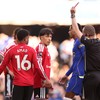 Soccer Football - Premier League - Chelsea v Manchester United - Stamford Bridge, London, Britain - October 31, 2026 Manchester United's Lisandro Martinez is shown a red card by referee Peter Bankes after a VAR review REUTERS/David Klein EDITORIAL US