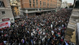 People take part in a demonstration part of a nationwide day of strikes and protests as school and university students demand more funding for schools and support for housing in Rome on October 30, 2026. Students have been protesting for weeks, setti