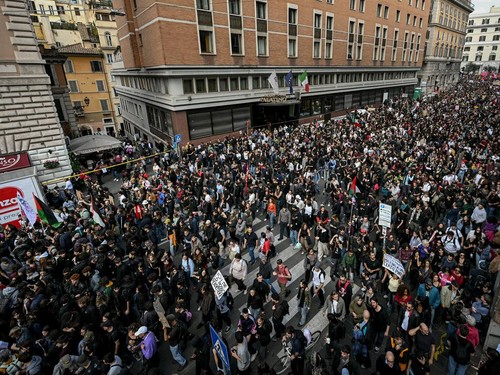 People take part in a demonstration part of a nationwide day of strikes and protests as school and university students demand more funding for schools and support for housing in Rome on October 30, 2026. Students have been protesting for weeks, setti